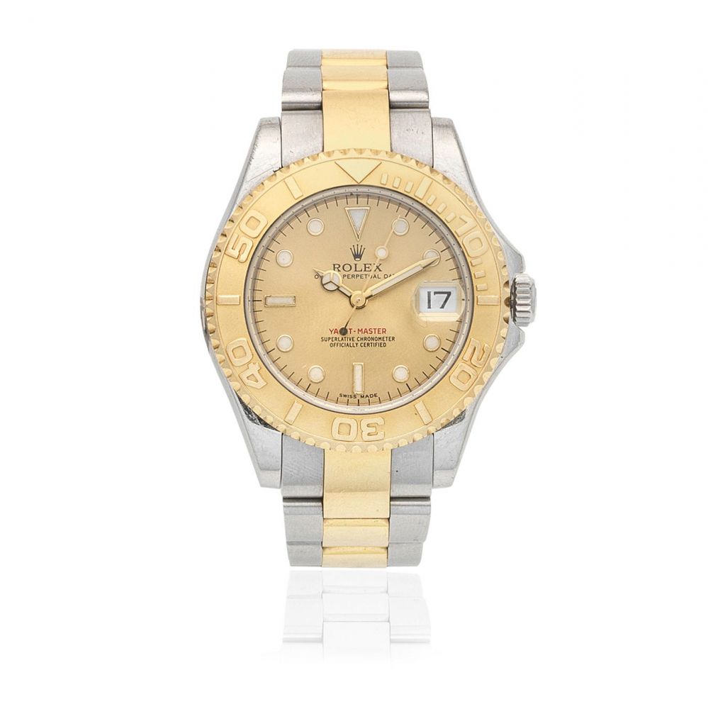 Rolex. A mid-size stainless steel and gold automatic calendar bracelet watch