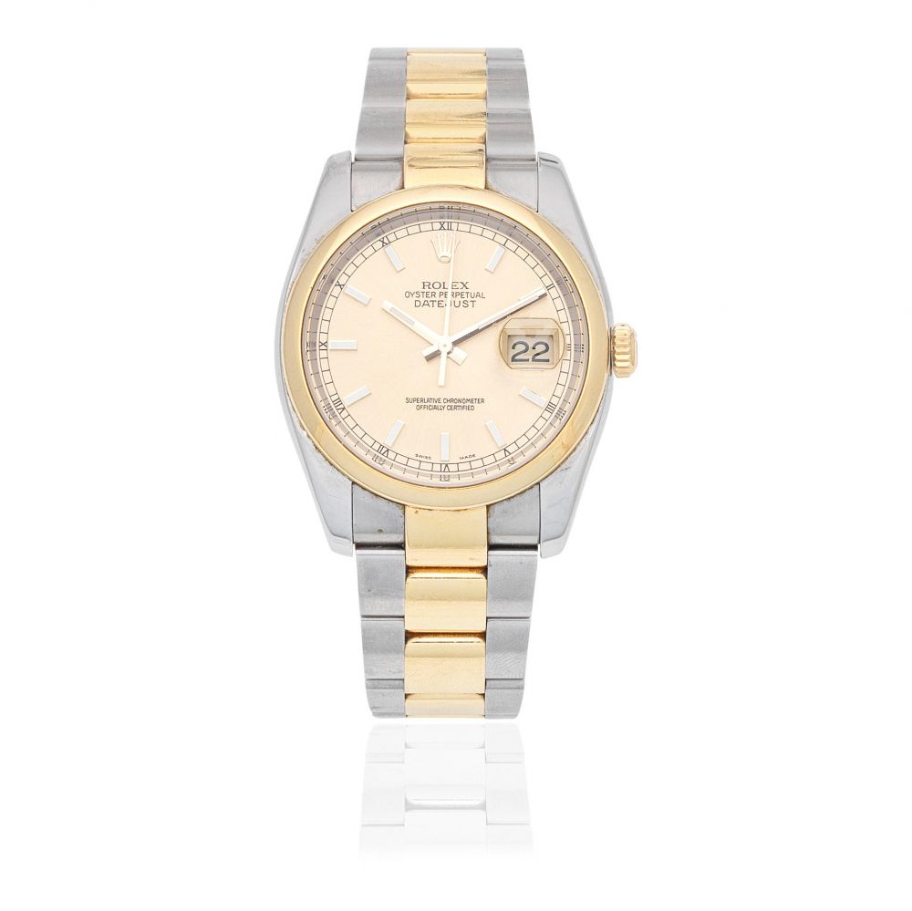 Rolex. A stainless steel and gold automatic calendar bracelet watch