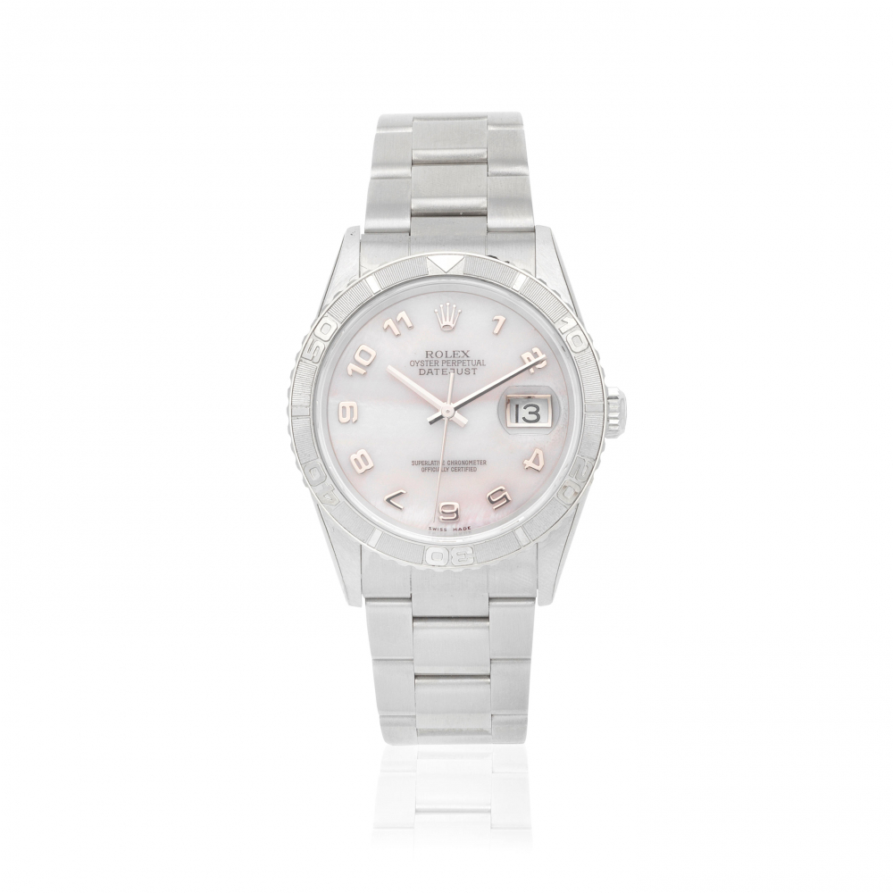 Rolex. A stainless steel automatic calendar bracelet watch with mother of pearl dial