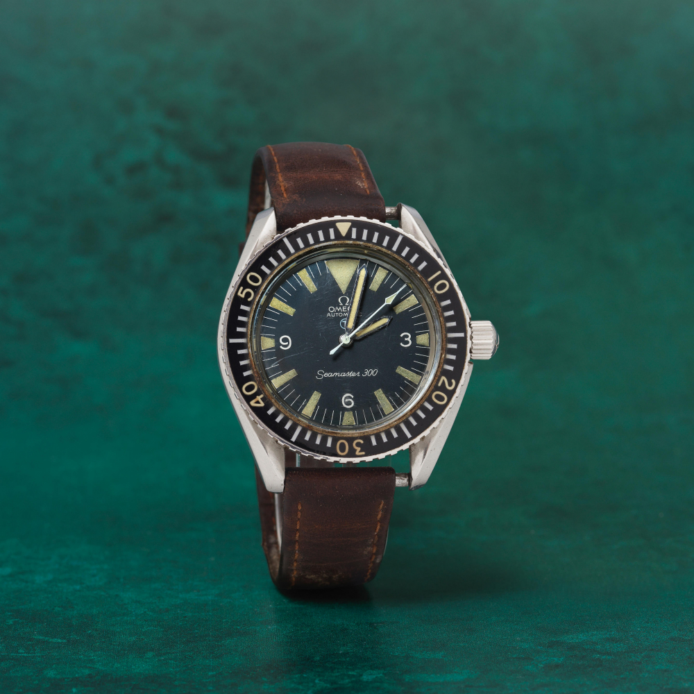 Omega. A rare military stainless steel automatic wristwatch issued to the Royal Navy and offered on behalf of the family of the original owner