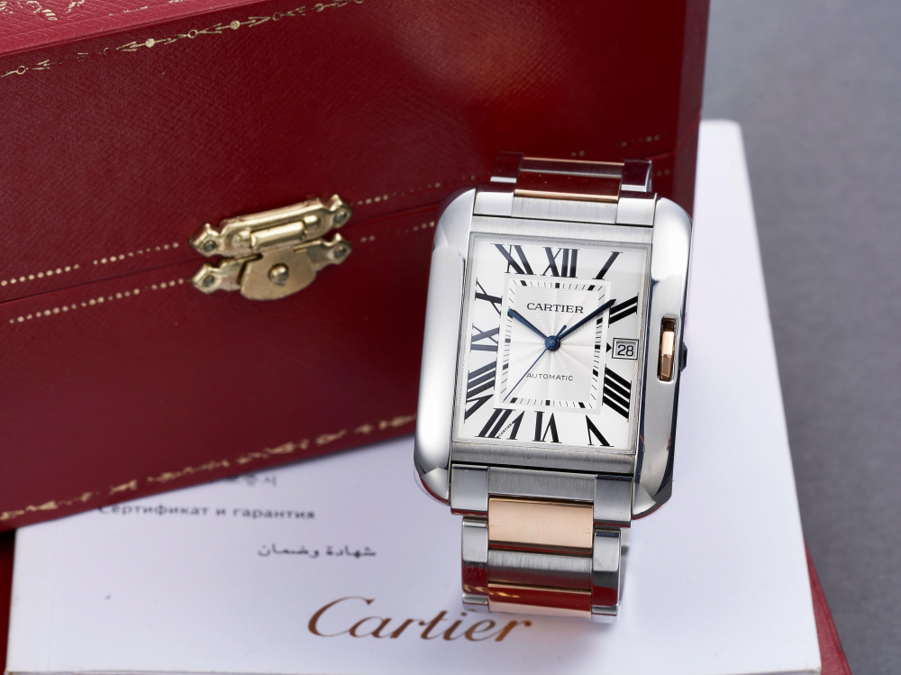CARTIER | TANK ANGLAISE XL, REF.W5310006, A PINK GOLD AND STAINLESS STEEL BRACELET WATCH WITH DATE, CIRCA 2012