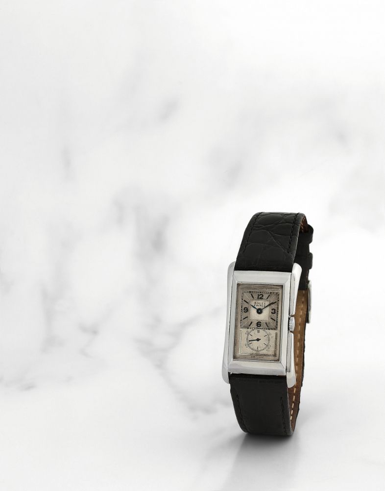 Rolex. Belle montre bracelet en acier de forme rectangulaire mouvement mécanique