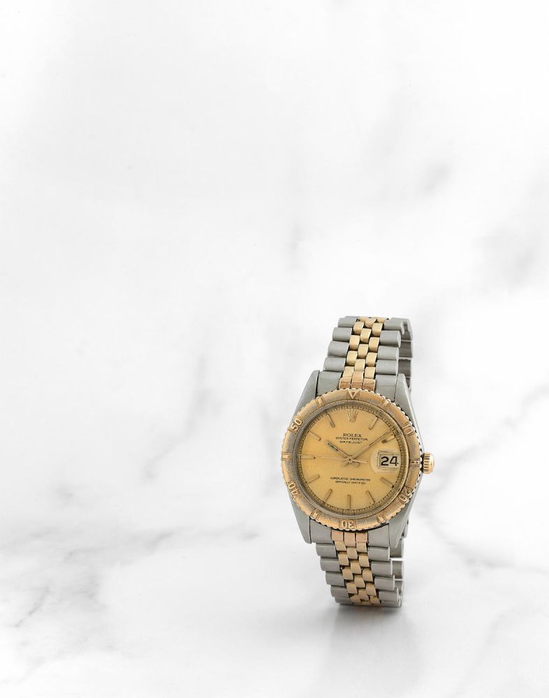 Rolex. Montre bracelet en or jaune 18K (750) et acier avec date mouvement automatique