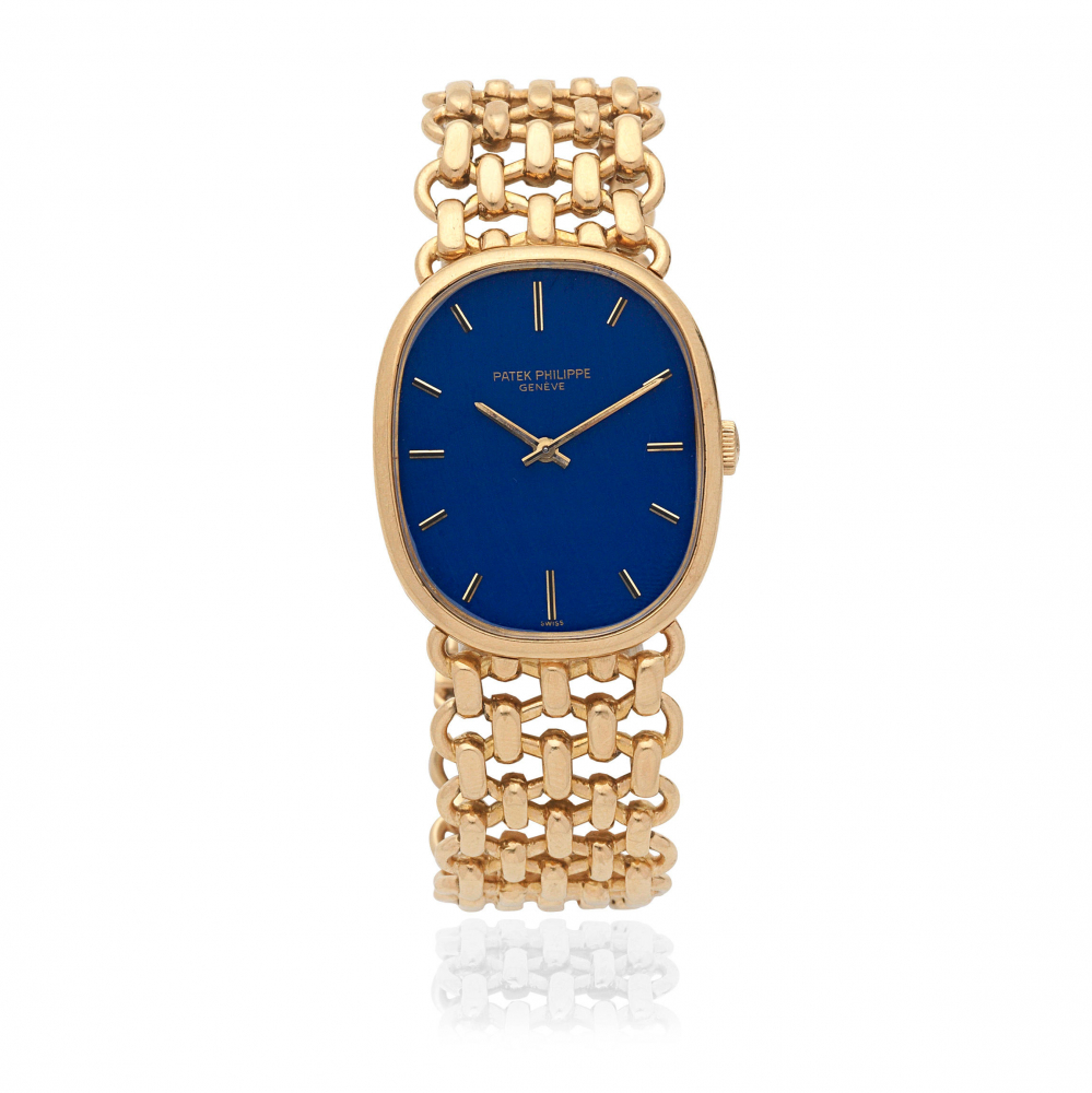 Patek Philippe. A lady's 18K gold manual wind bracelet watch