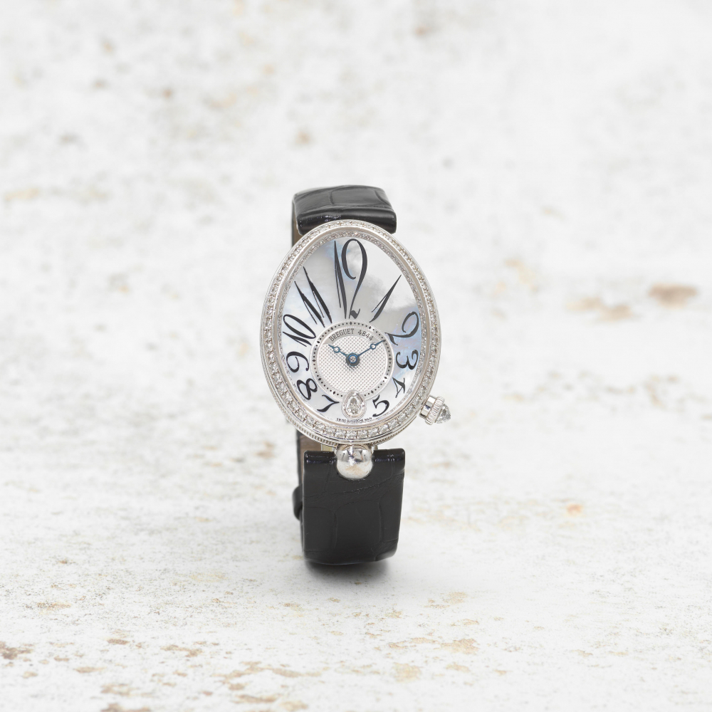 Breguet. A lady's fine 18K white gold and diamond set automatic calendar wristwatch