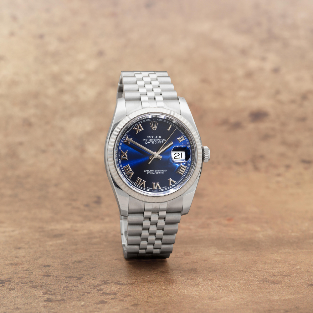 Rolex. A stainless steel and 18K white gold automatic calendar bracelet watch