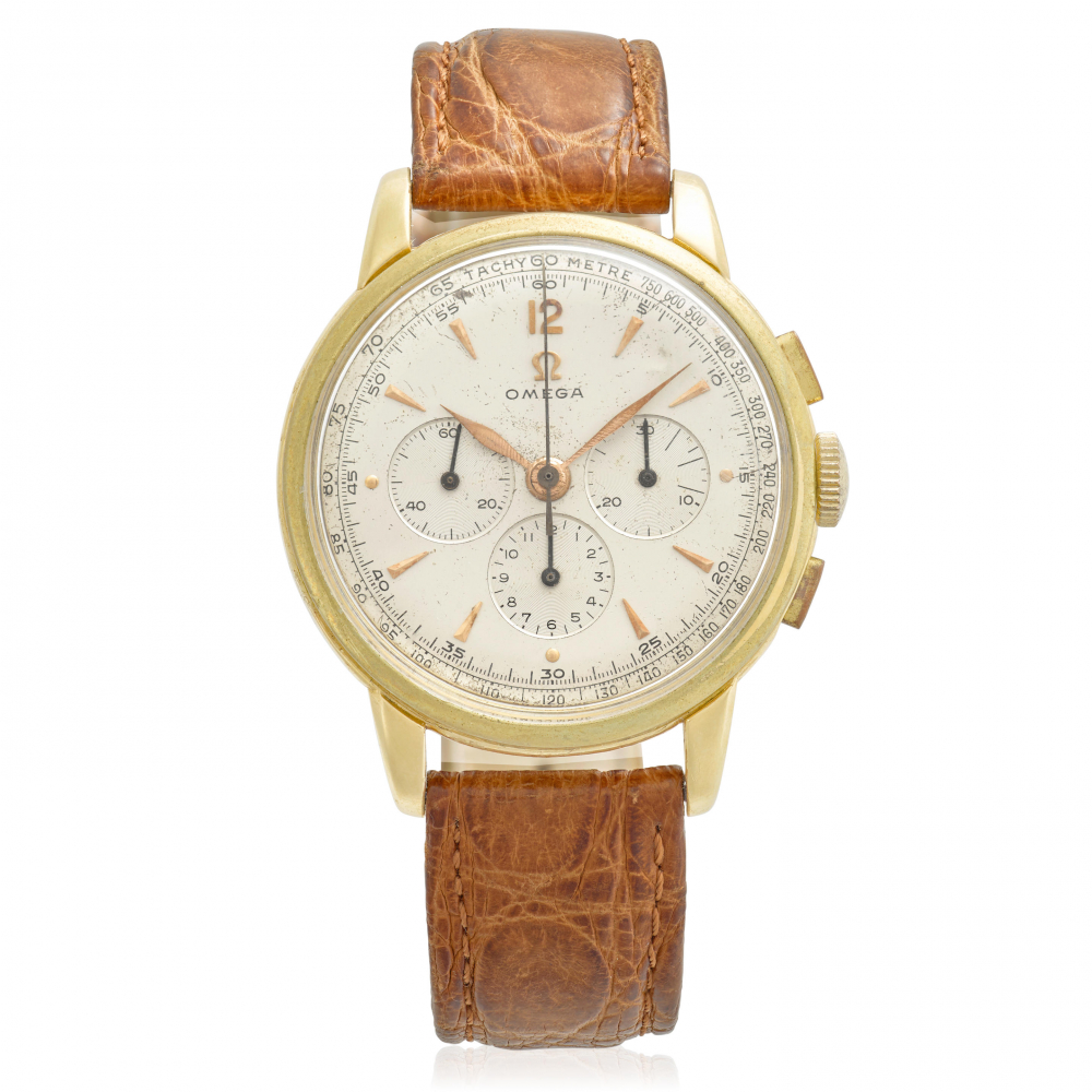 OMEGA. AN 18K GOLD AUTOMATIC BRACELET WATCH