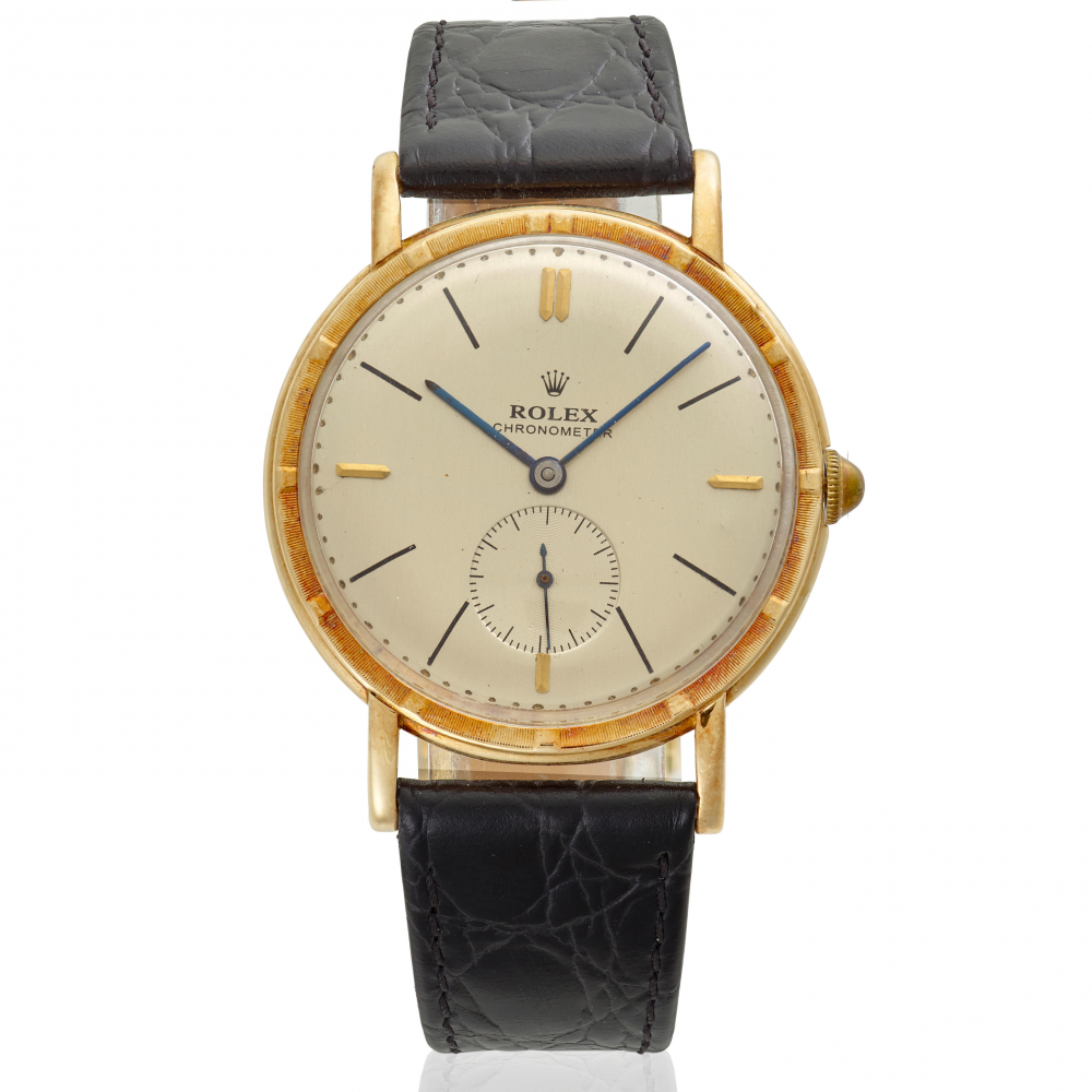 ROLEX. A 14K GOLD MANUAL WIND WRISTWATCH