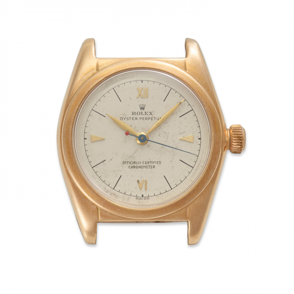 ROLEX. A 14K GOLD AUTOMATIC WRISTWATCH