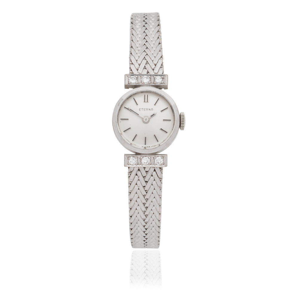 Eterna. A lady's 18K white gold and diamond set manual wind cocktail bracelet watch