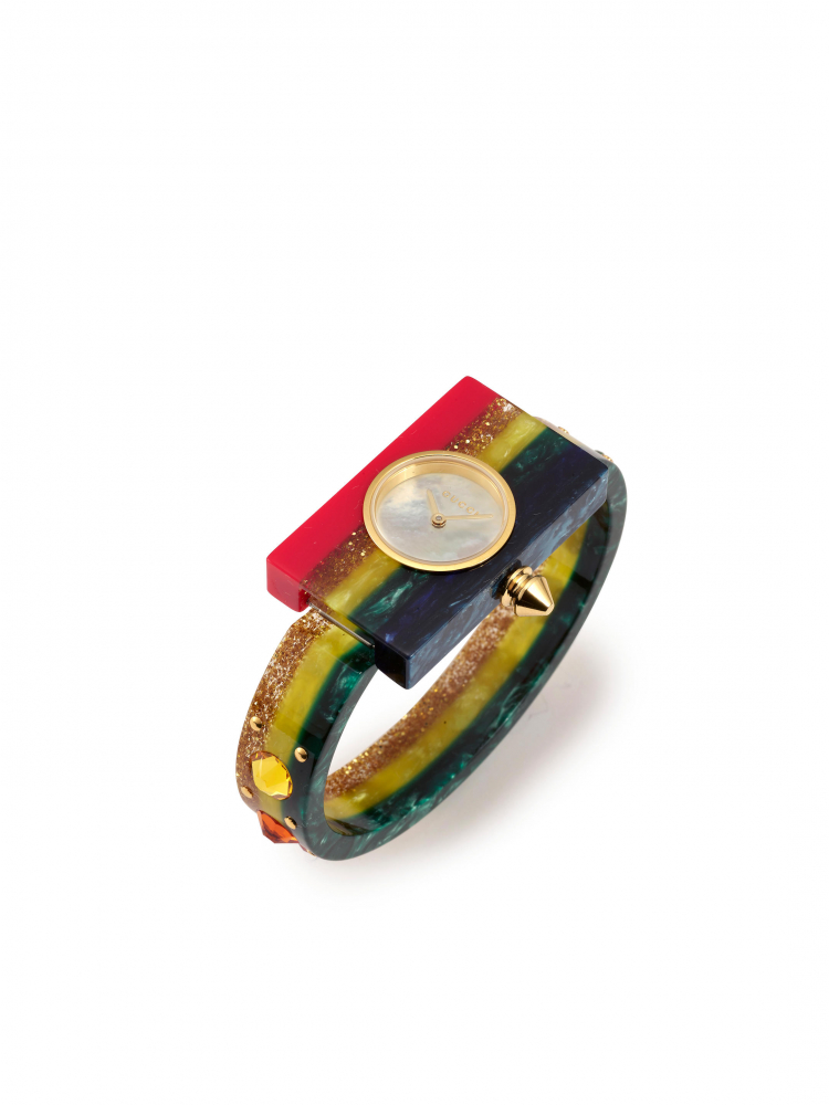 GUCCI: STRIPED RED AND GREEN PLEXIGLASS WATCH FROM THE SKELETON COLLECTION