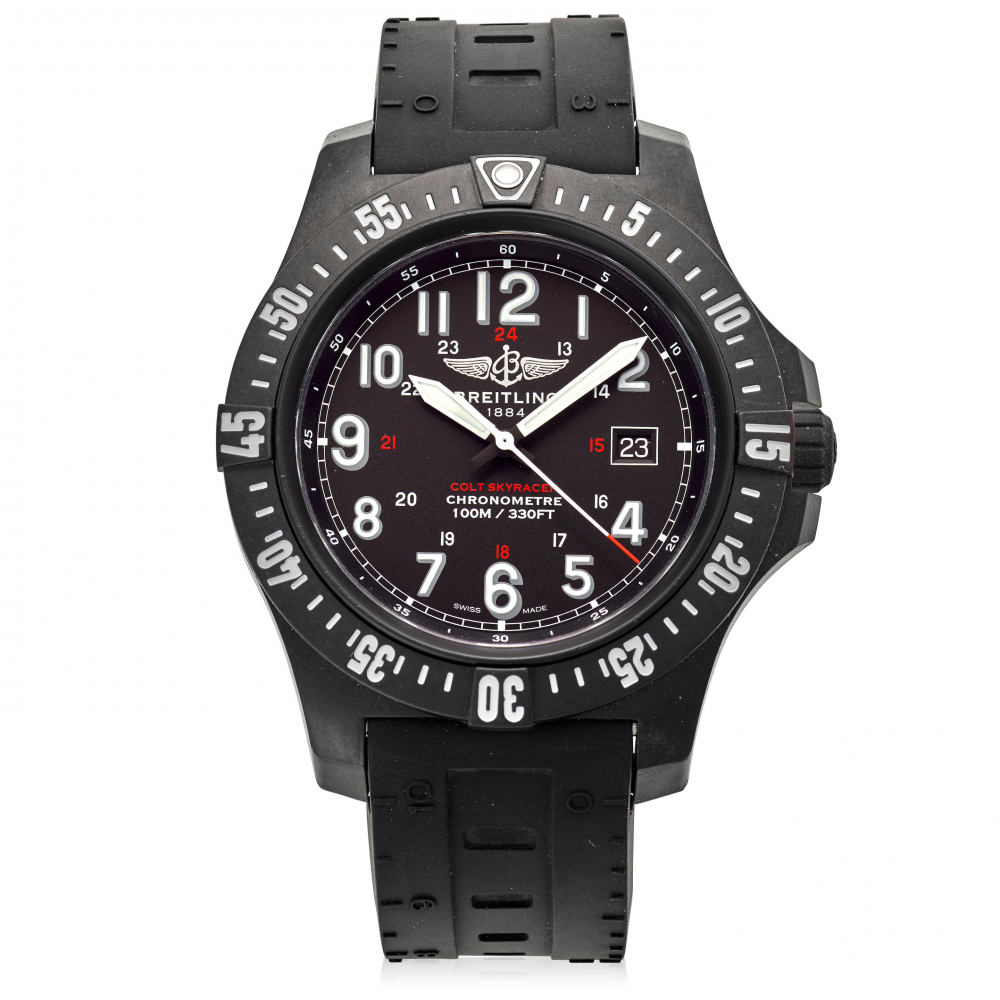 BREITLING. A CARBON QUARTZ CALENDAR WRISTWATCH