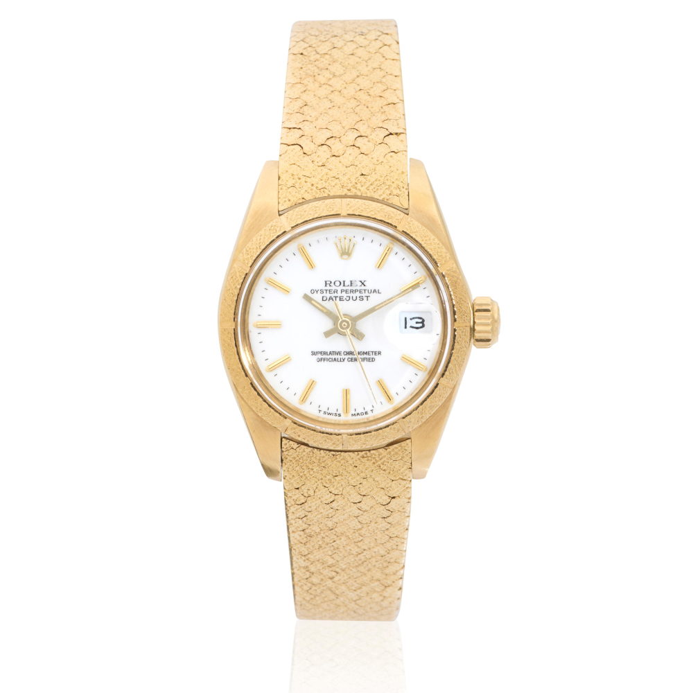 Rolex. A lady's 18K gold automatic calendar bracelet watch