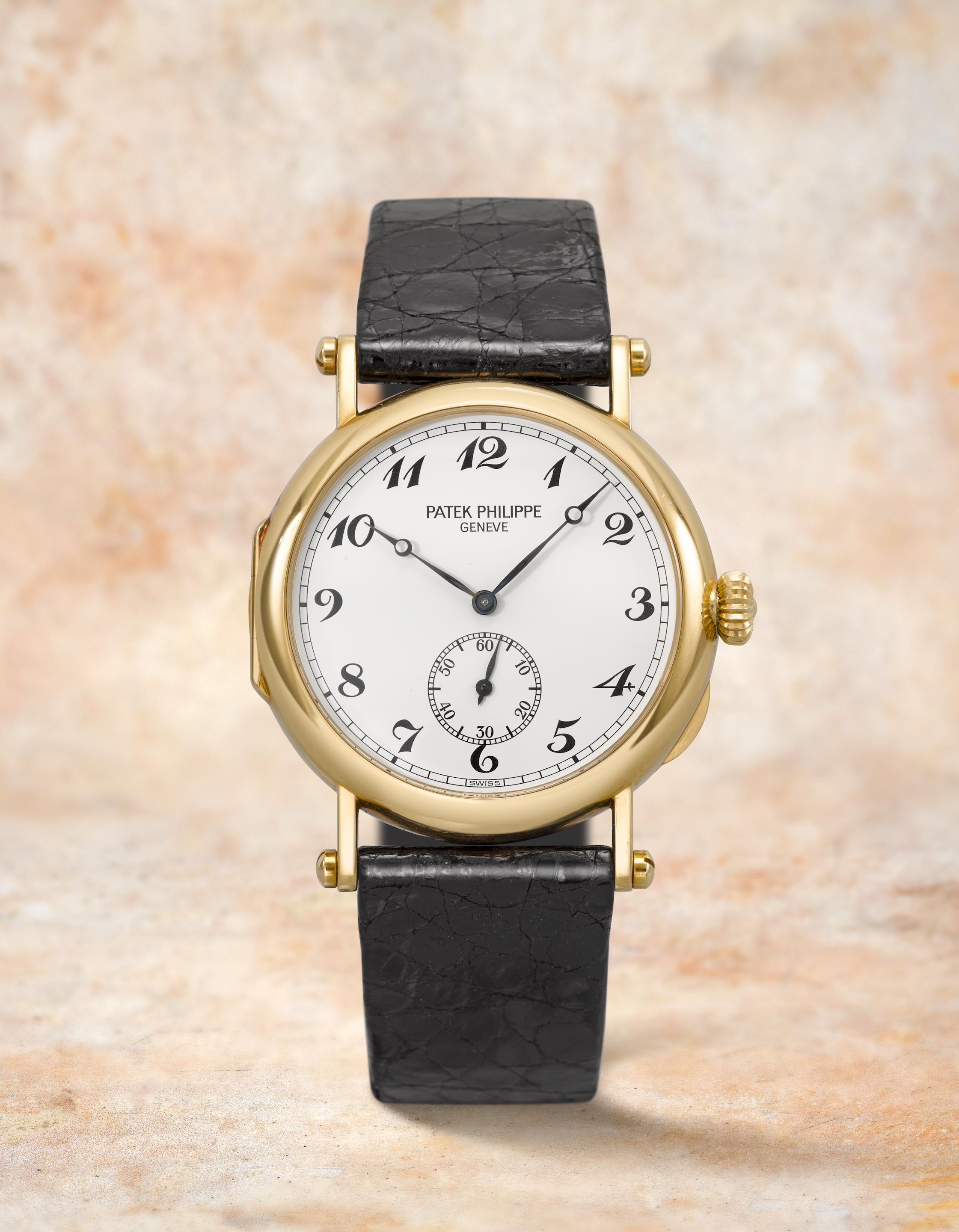 Patek Philippe. A fine and rare 18K gold manual wind anniversary officers wristwatch