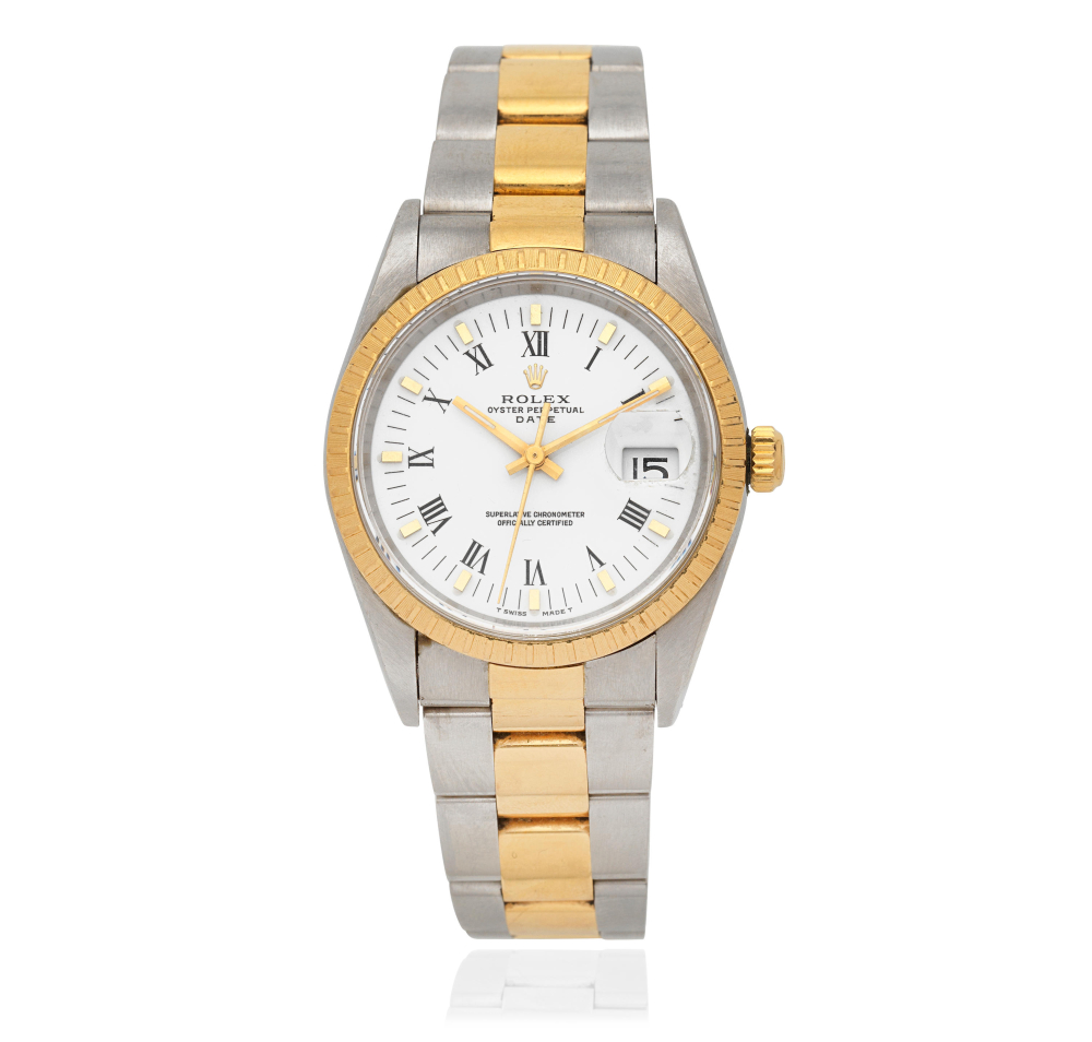 Rolex. A stainless steel and gold automatic calendar bracelet watch