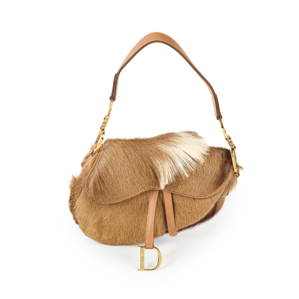 Christian DIOR, année 2000. Sac "Saddle" en vachette.