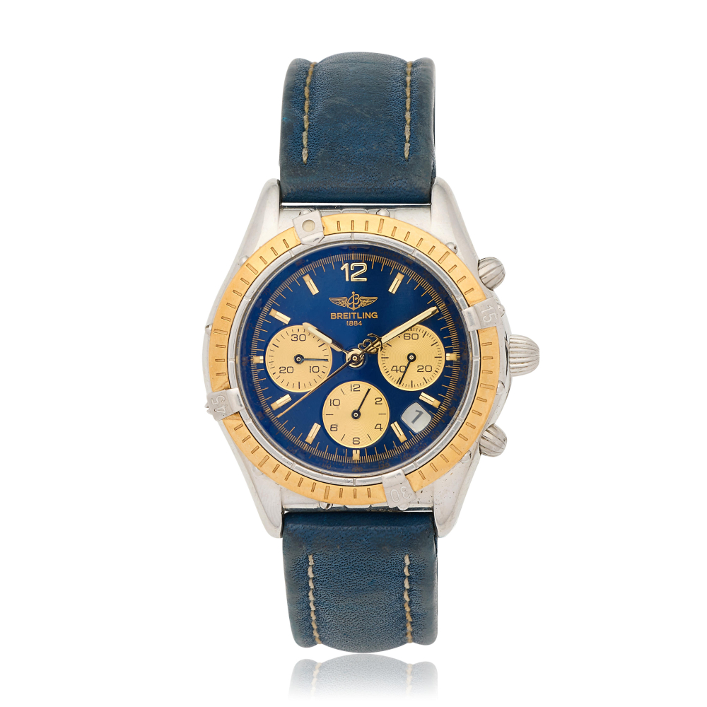 Breitling. A stainless steel and gold automatic calendar chronograph wristwatch