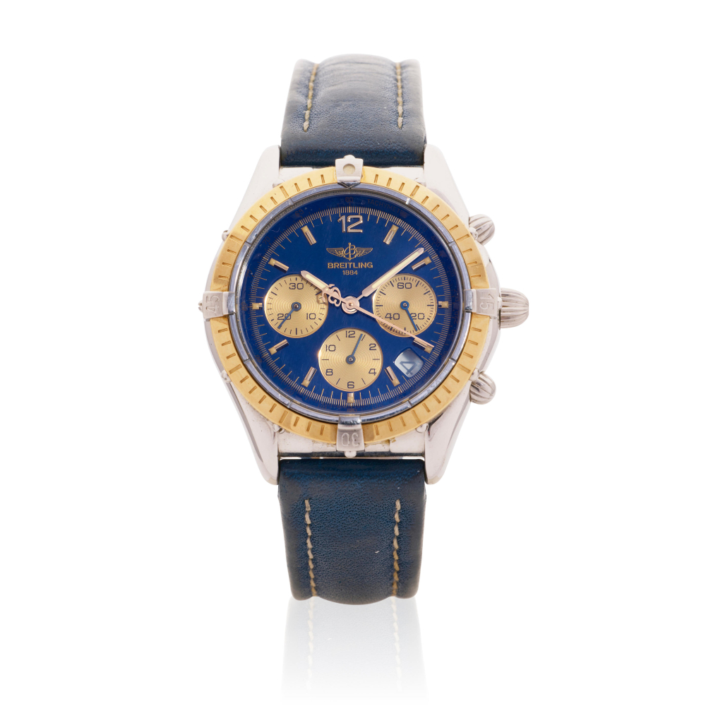 Breitling. A stainless steel and gold automatic calendar chronograph wristwatch