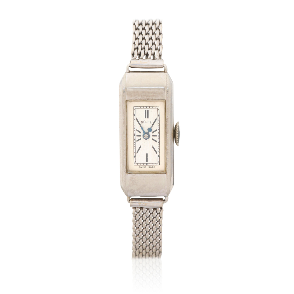 Rolex. A lady's 14K white gold manual wind bracelet watch
