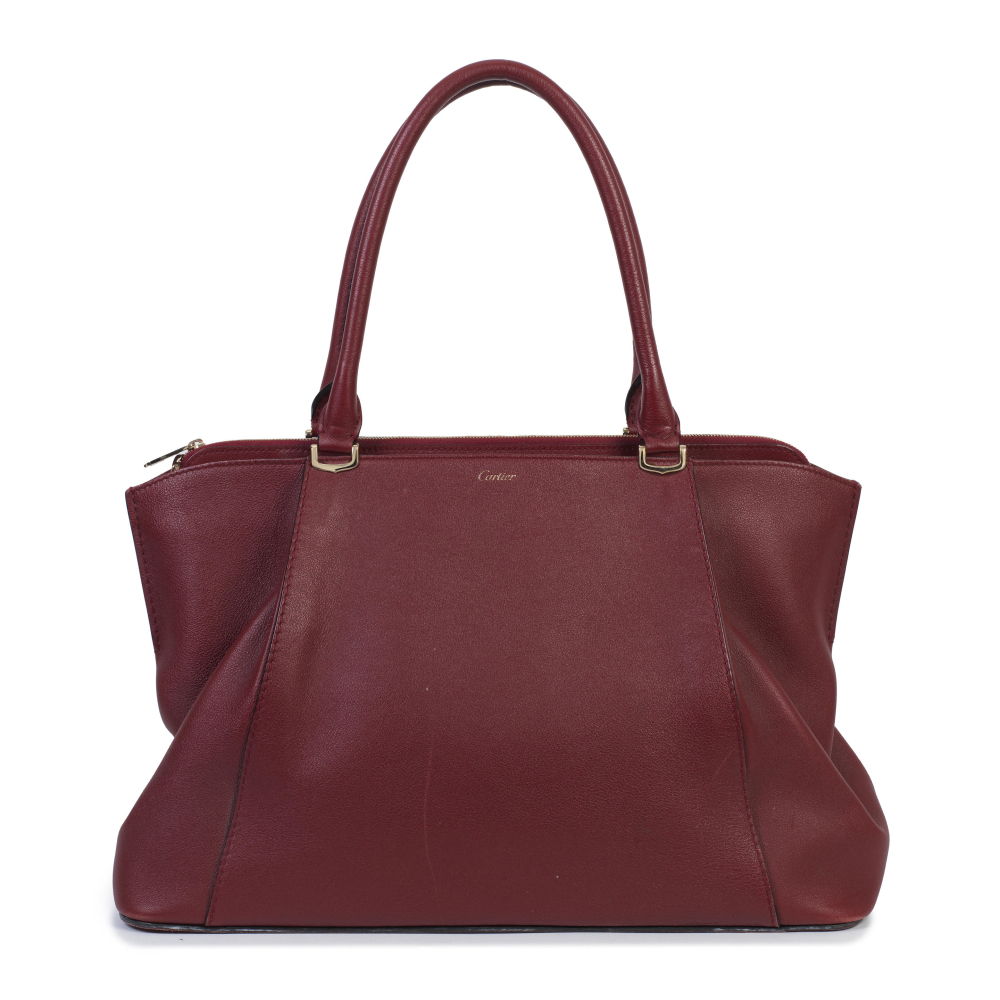 Cartier: a Red Spinel C de Cartier Medium Handbag
