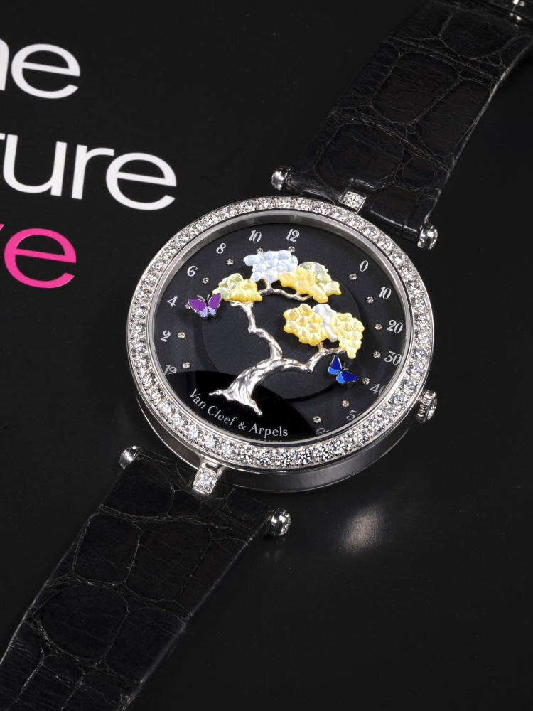 VAN CLEEF & ARPELS | POETIC COMPLICATIONS, REF.VCARO44100, A WHITE GOLD AND DIAMOND-SET WRISTWATCH WITH MOTHER-OF-PEARL AND ENAMEL DIAL AND RETROGRADE HOURS AND MINUTES, CIRCA 2020