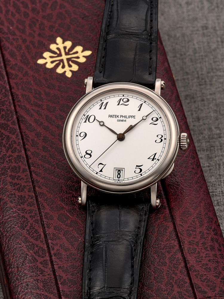 PATEK PHILIPPE | CALATRAVA OFFICER, REF.5053, A WHITE GOLD WRISTWATCH WITH DATE, CIRCA 2000