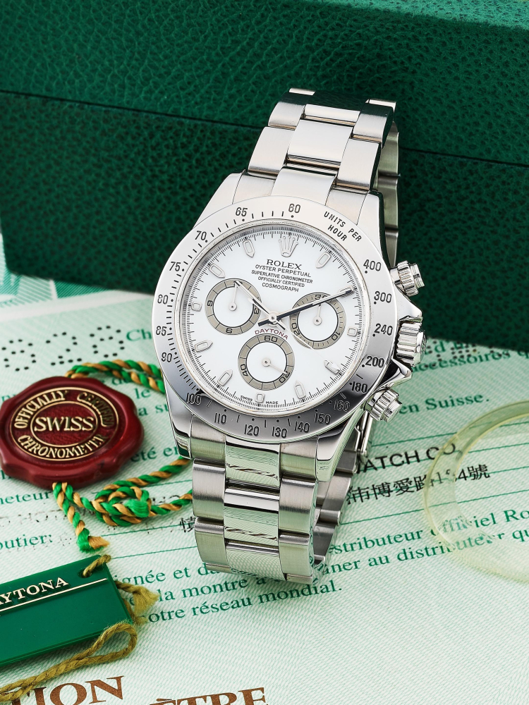 ROLEX | COSMOGRAPH DAYTONA, REF.116520, A STAINLESS STEEL CHRONOGRAPH BRACELET WATCH WITH FAINT CREAM DIAL, CIRCA 2000