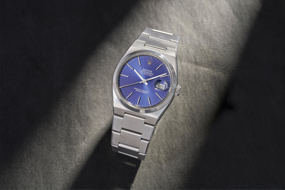 ROLEX. A STAINLESS STEEL QUARTZ CALENDAR BRACELET WATCH
