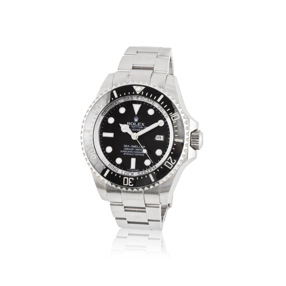 Rolex. A stainless steel automatic calendar bracelet watch