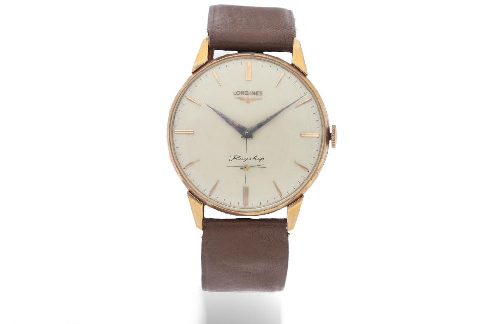 Longines. An Oversized Pink Gold Wristwatch