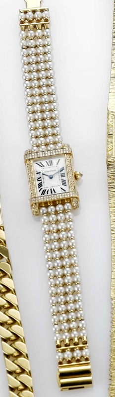 Cartier. A fine 18ct gold pearl and diamond set bracelet watch with box and papers