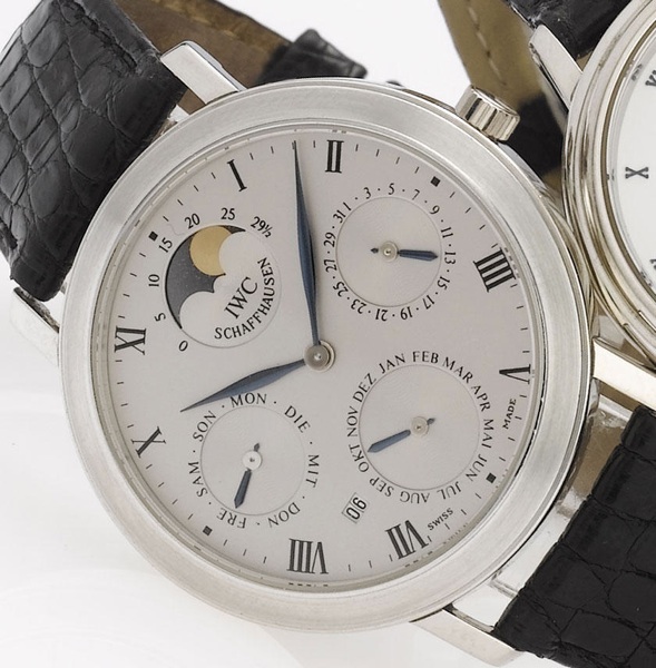 International Watch Co. A fine platinum astronomic calendar wirstwatch together with fitted box and papers