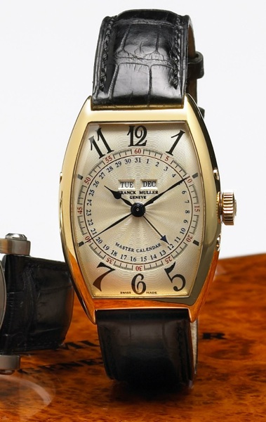 Franck Muller. An 18k gold tonneau cased self-winding calendar wristwatch