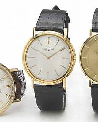 Vacheron & Constantin. A slim 18k gold circular cased wristwatch