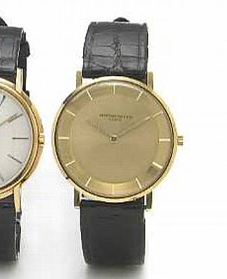 Vacheron & Constantin. An 18k gold slim round cased wristwatch