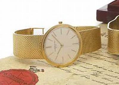 Vacheron & Constantin. An 18k gold slim circular cased bracelet watch