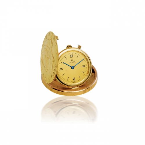 Rolex. A fine and rare 18ct gold twenty dollar coin manual-winding clock