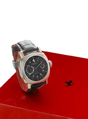 Officine Panerai. A fine stainless steel automatic calendar twin time zone wristwatch with power reserve, together with fitted box and papers