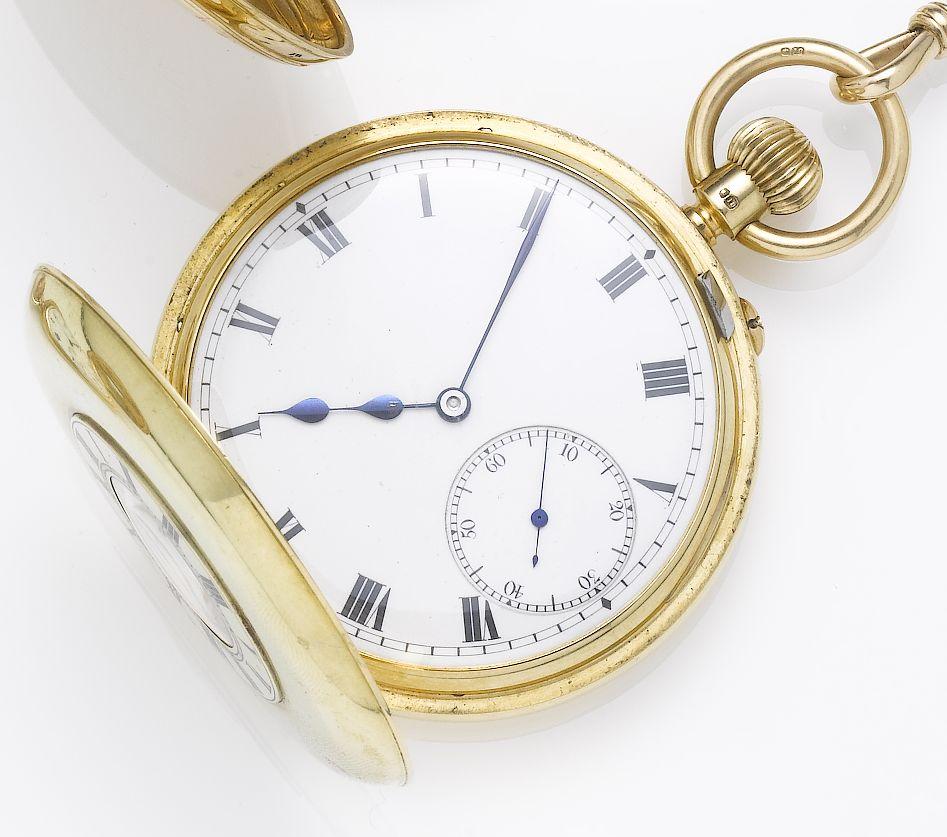 Manoah Rhodes & Sons. A late 19th century 18ct gold half hunter pocket watch together with a gold fetter link chain, winding tool and propelling pencil