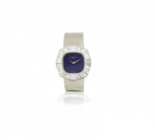 Patek Philippe. A fine and rare 18ct white gold diamond manual wind ladies wristwatch