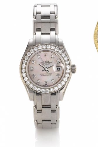 Rolex. A lady's fine 18ct white gold diamond set bracelet watch