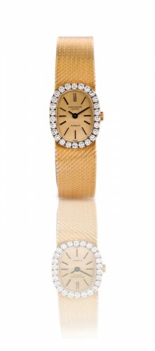 Patek Philippe. A fine 18ct gold manual wind ladies wristwatch with diamond made for Gubelin