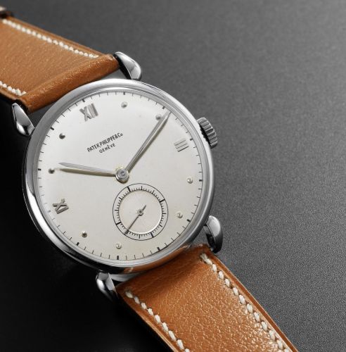 Patek Philippe. A fine and rare stainless steel wristwatch with claw shaped lugs and original silvered dial together with Extract from Archives