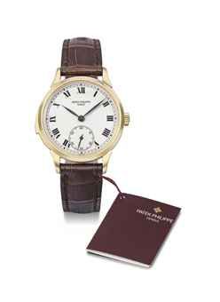 Patek Philippe. A very fine and rare 18K gold automatic minute repeating wristwatch with original certificate and box