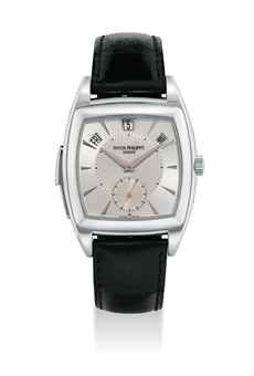 PATEK PHILIPPE. A VERY FINE AND RARE PLATINUM TONNEAU-SHAPED AUTOMATIC MINUTE REPEATING ANNUAL CALENDAR WRISTWATCH WITH ORIGINAL CERTIFICATE, ADDITIONAL CASE BACK AND BOX