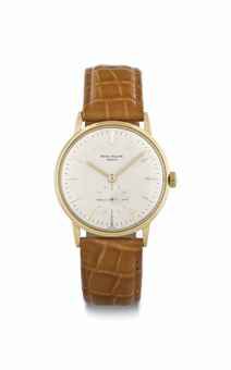 Patek Philippe. An 18k Gold Automatic Wristwatch