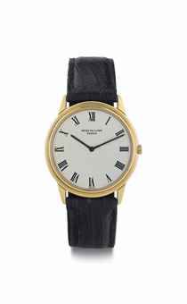Patek Philippe. An 18k Gold Automatic Wristwatch