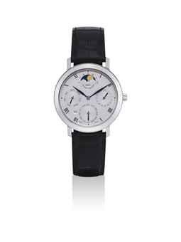 IWC. A FINE, RARE AND SLIM PLATINUM PERPETUAL CALENDAR WRISTWATCH WITH MOON PHASES AND YEAR DISPLAY