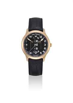 CARLO FERRARA. AN 18K GOLD AUTOMATIC WRISTWATCH WITH SWEEP CENTRE SECONDS AND DATE