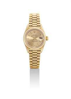 ROLEX. A LADY'S 18K GOLD AUTOMATIC WRISTWATCH WITH SWEEP CENTRE SECONDS, DATE AND BRACELET